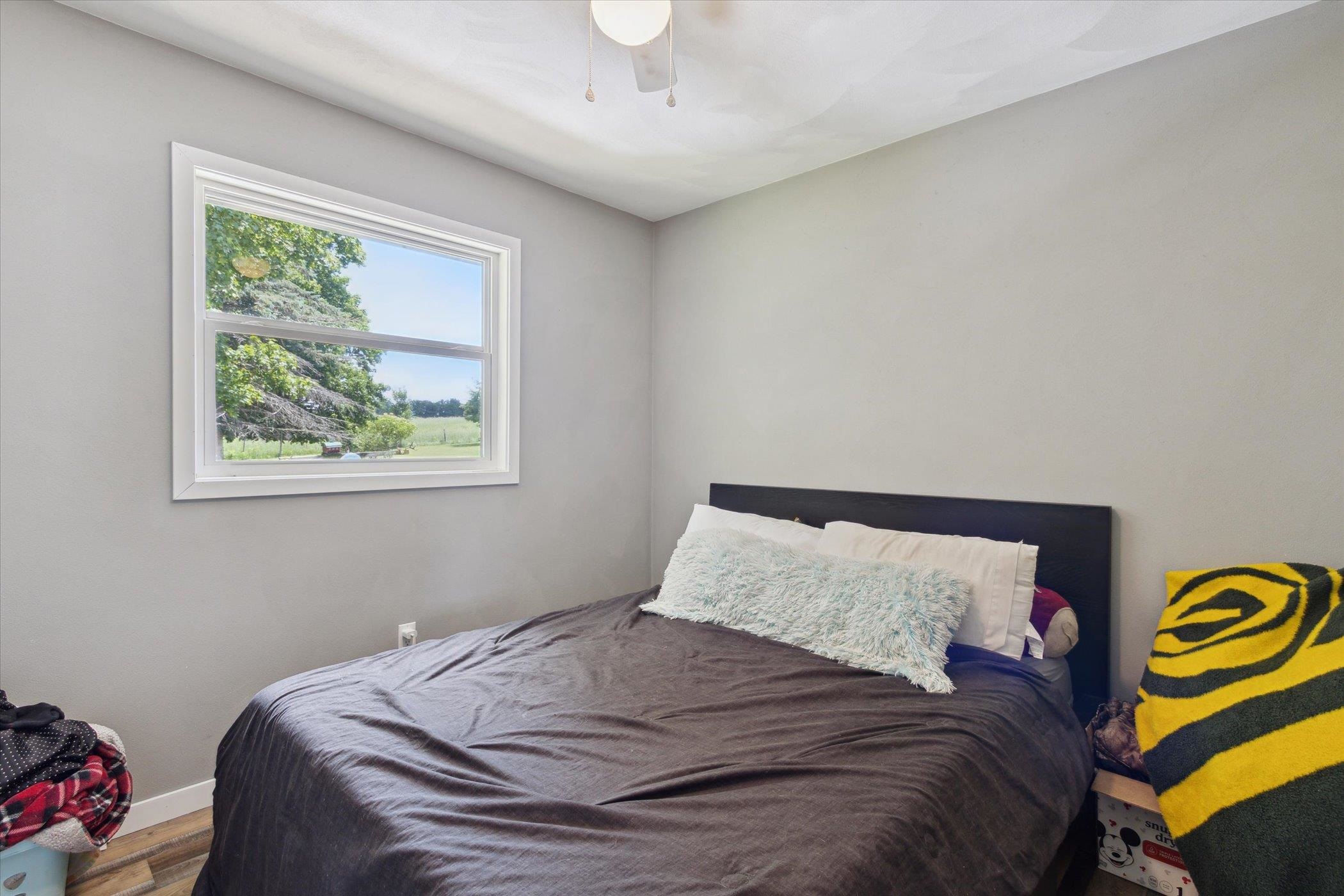 505 East State Line Road Orangeville, IL 61060 - Photo 21 of 58 a bedroom with a bed and a window