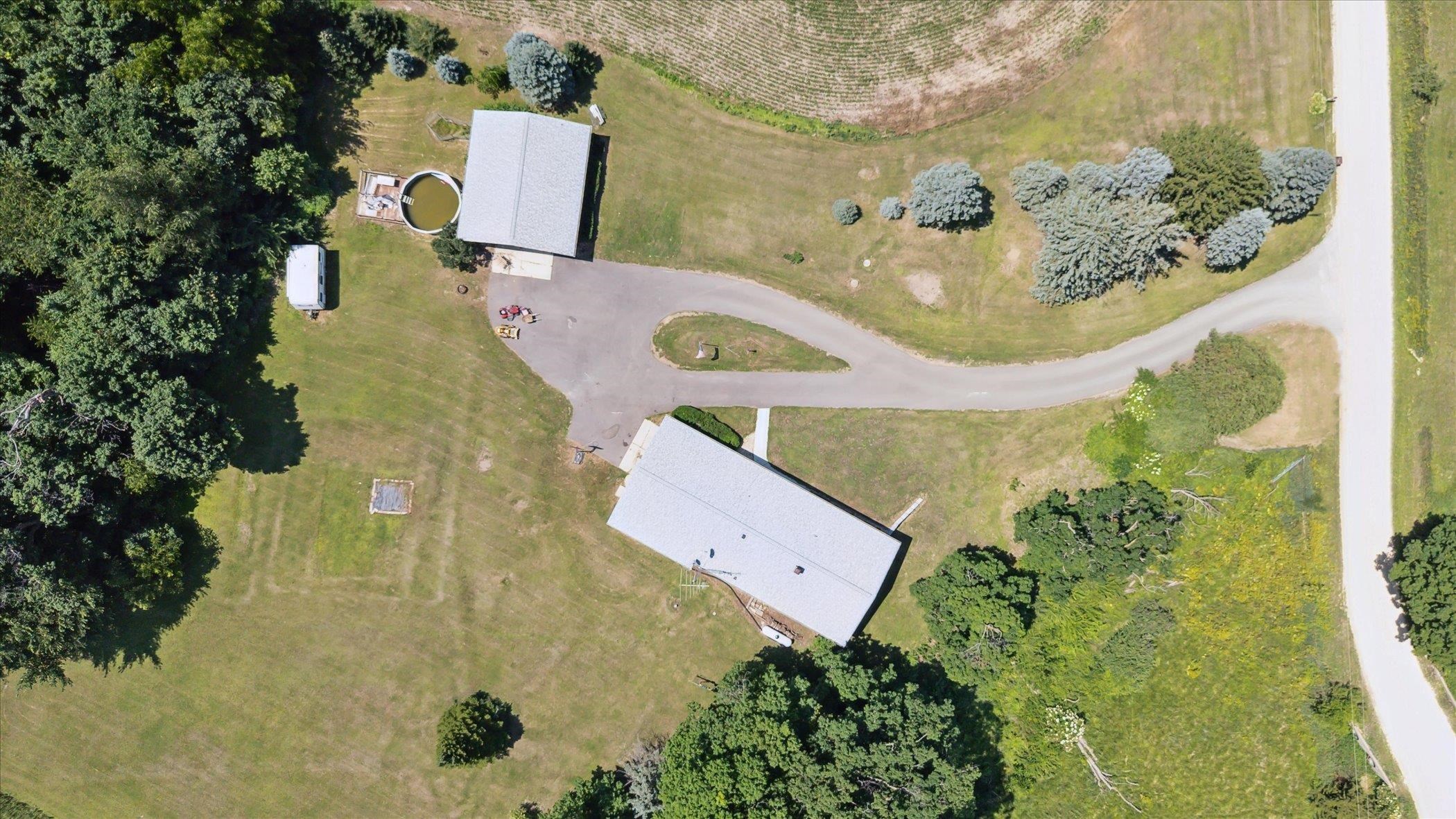 505 East State Line Road Orangeville, IL 61060 - Photo 45 of 58 an aerial view of a house with swimming pool