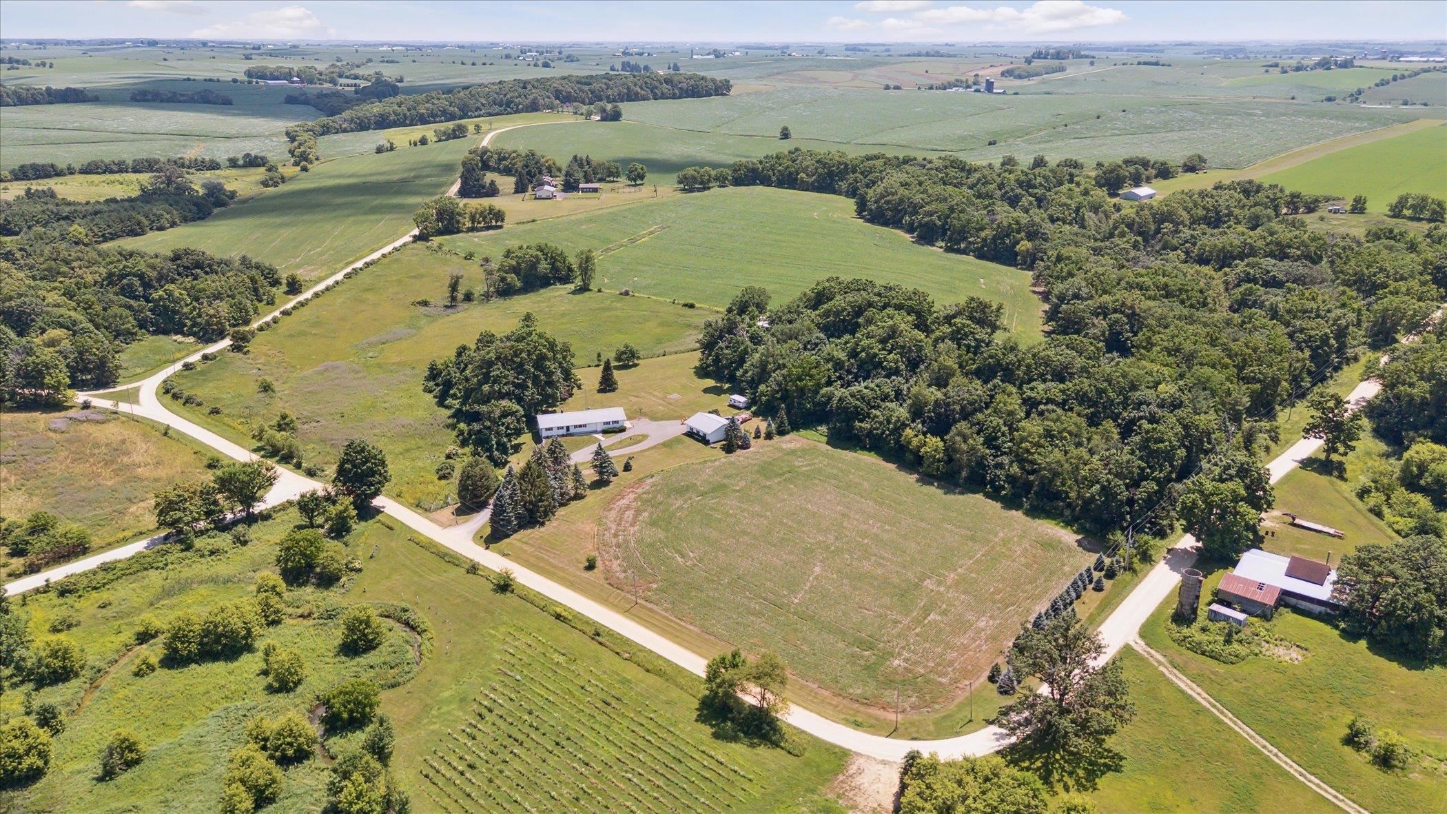 505 East State Line Road Orangeville, IL 61060 - Photo 47 of 58 an aerial view of a house with a yard