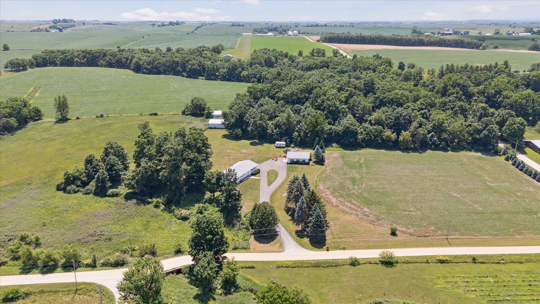 505 East State Line Road Orangeville, IL 61060 - Photo 54 of 58 an aerial view of mountain with residential house and lake view