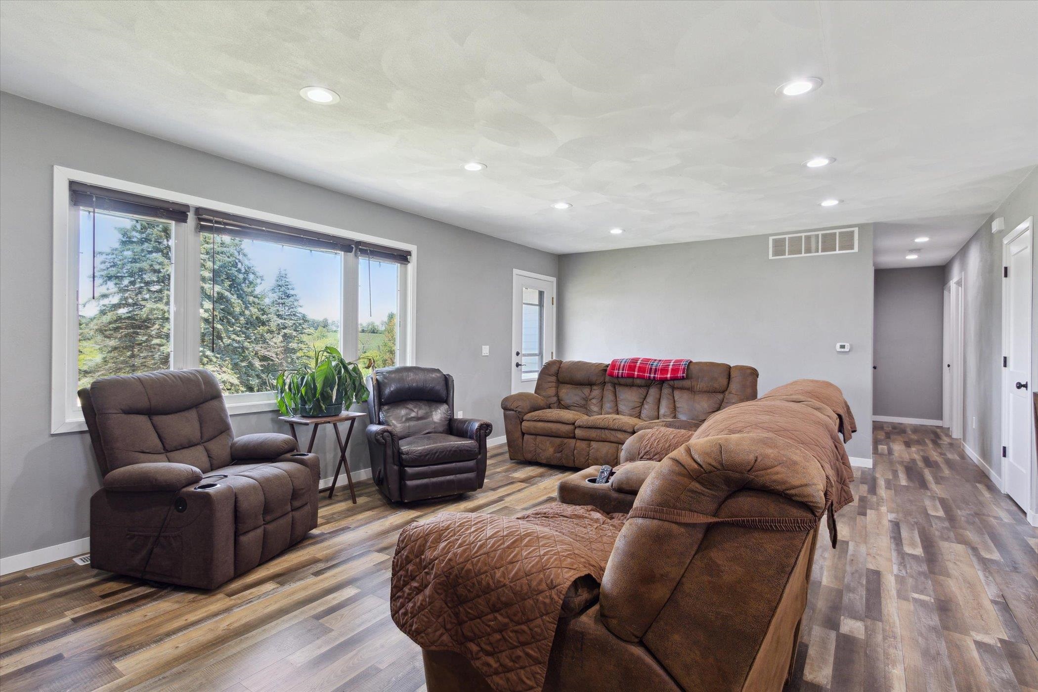 505 East State Line Road Orangeville, IL 61060 - Photo 6 of 58 a living room with furniture a couch and a large window