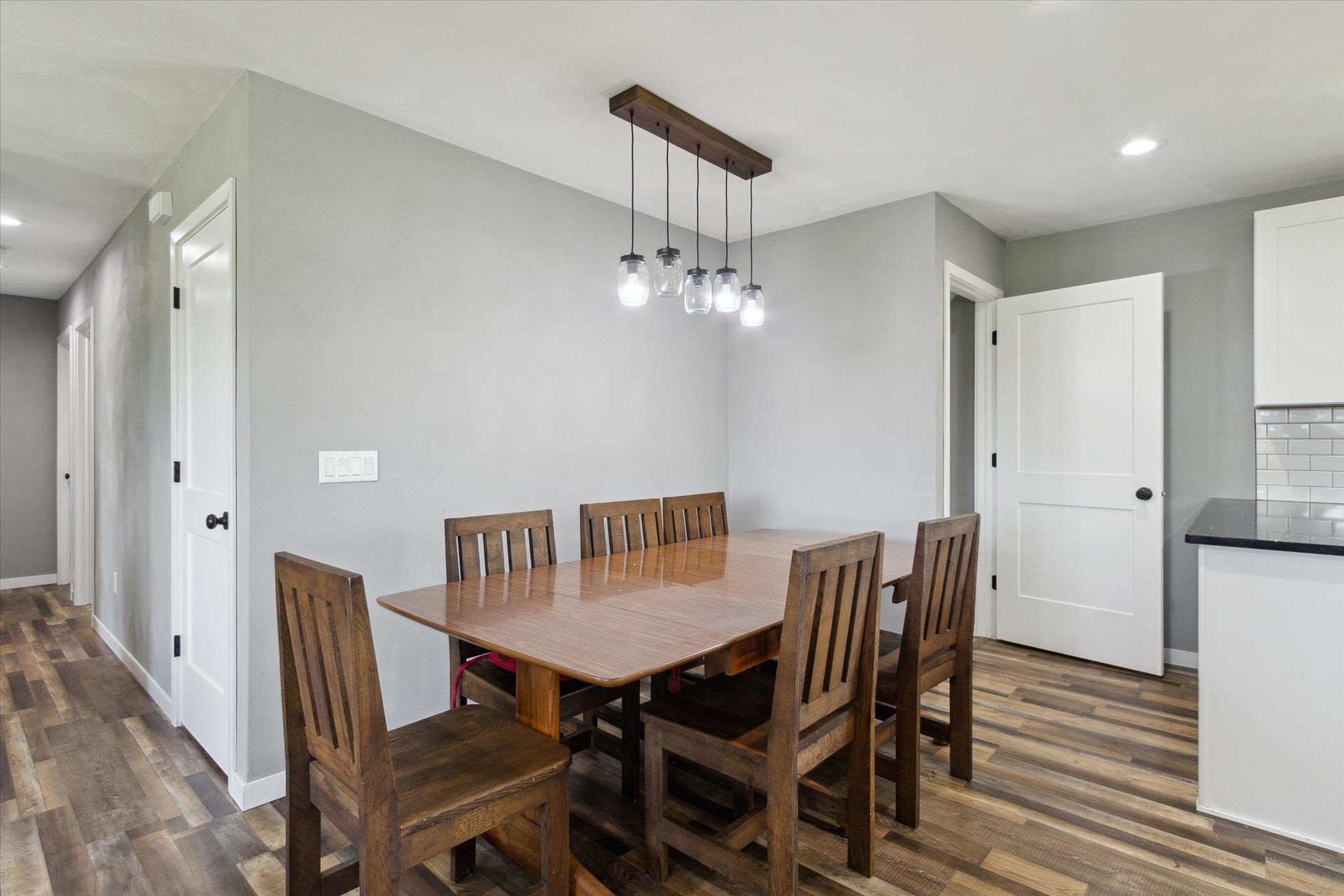 505 East State Line Road Orangeville, IL 61060 - Photo 10 of 58 a view of a dining room with furniture and wooden floor