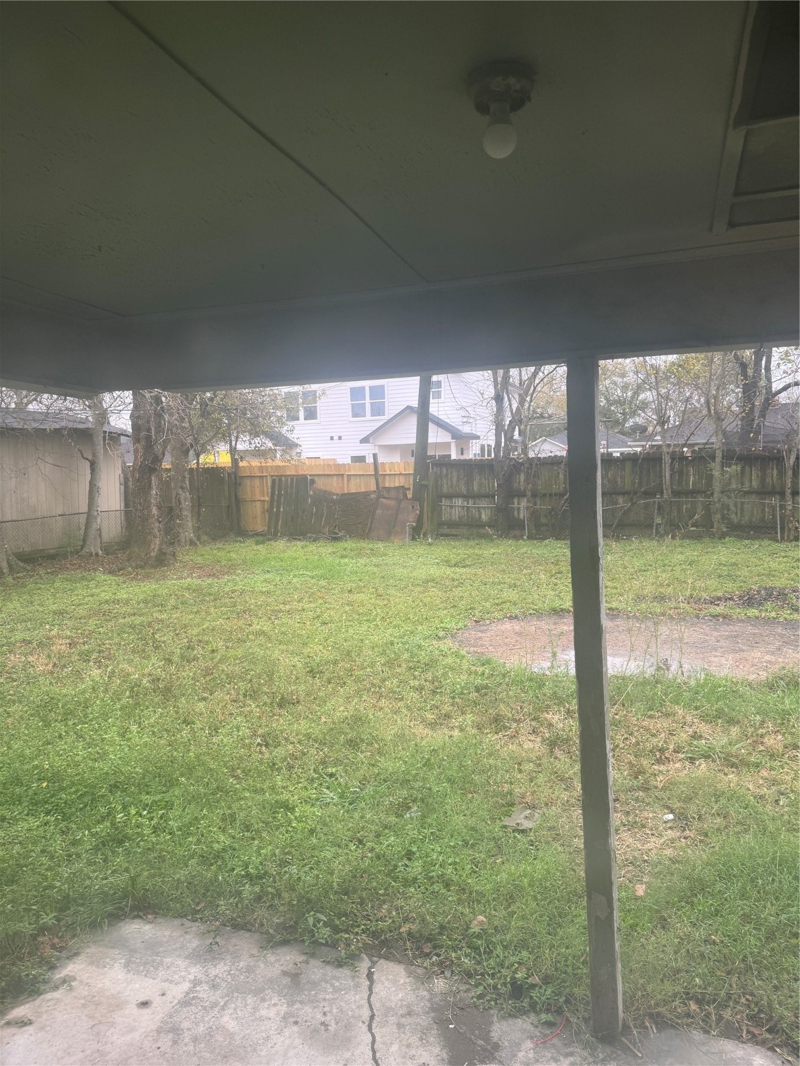 5950 Doolittle Boulevard Houston, TX 77033 - Photo 17 of 25 a view of a glass door and porch