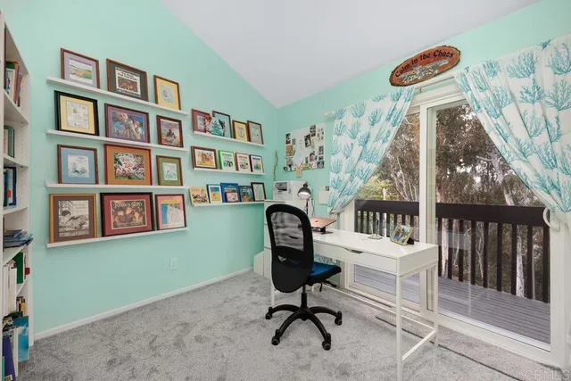 a bathroom with a granite countertop sink a toilet and a shower