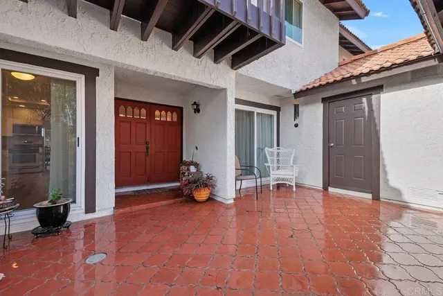 a view of room with furniture and wooden floor
