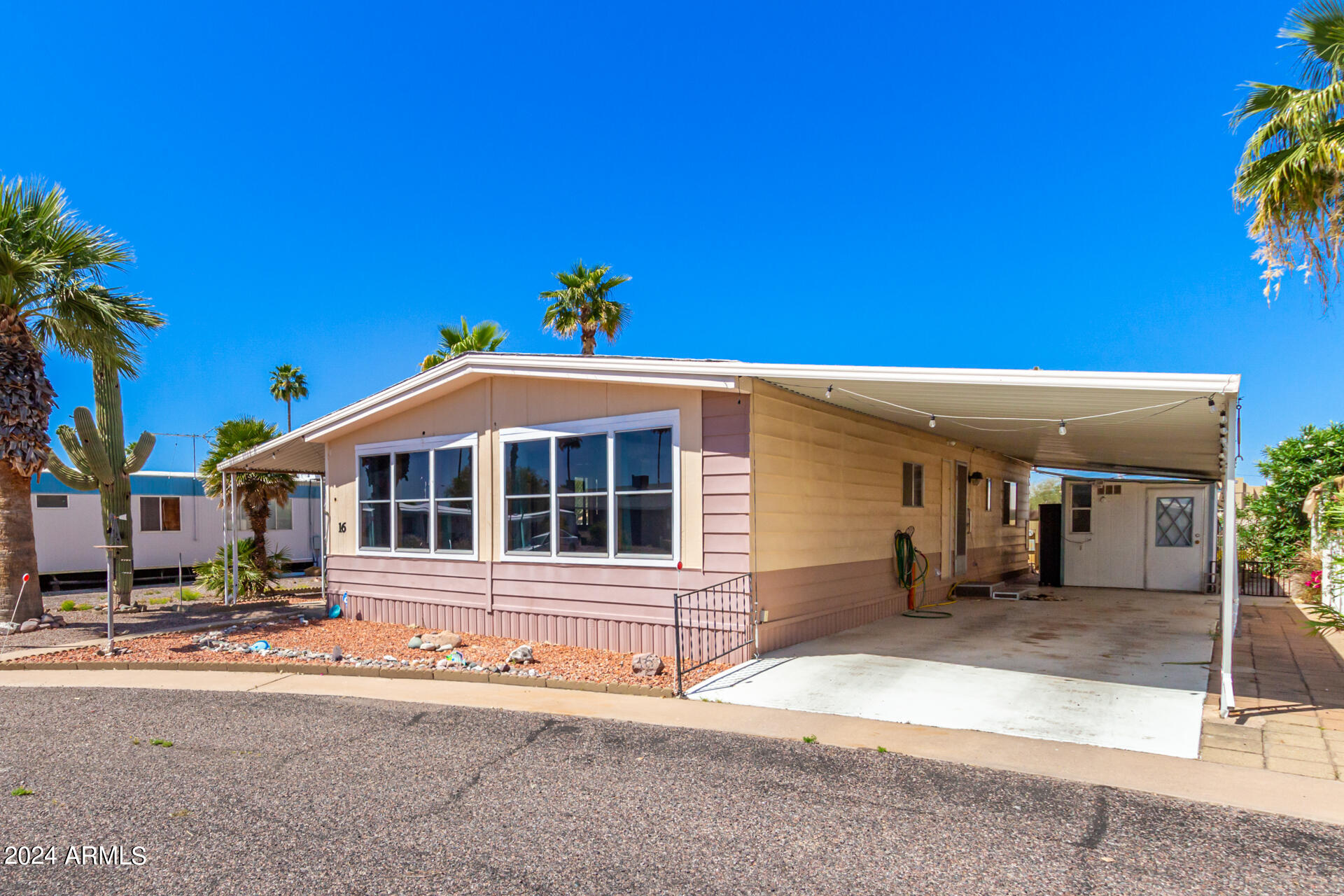 3405 South Tomahawk Road, Unit 16 Apache Junction, AZ 85119 - Photo 2 of 27 Carport