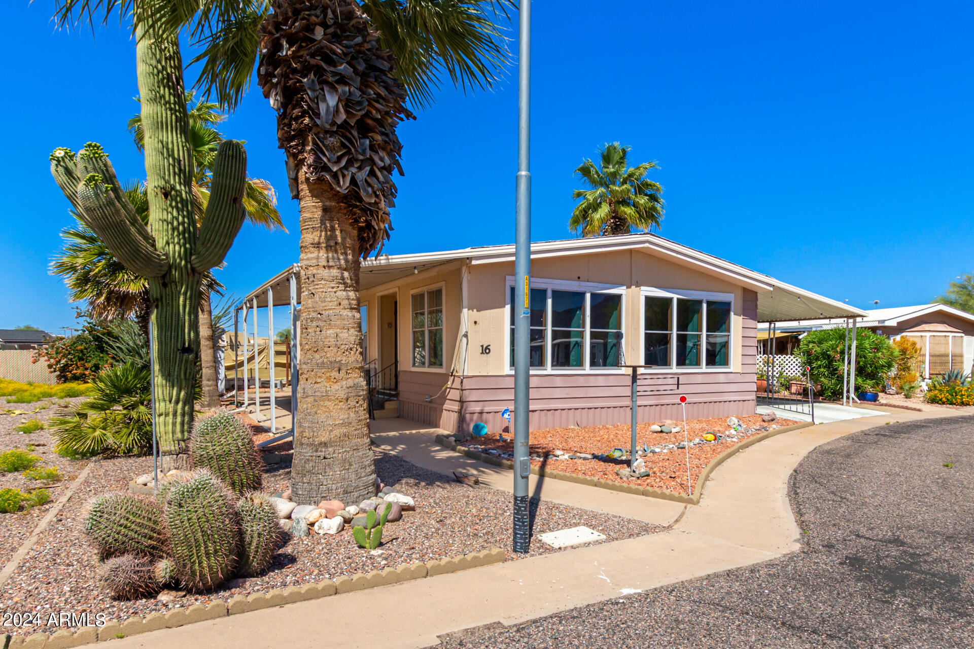 3405 South Tomahawk Road, Unit 16 Apache Junction, AZ 85119 - Photo 3 of 27 Sidewalk entry