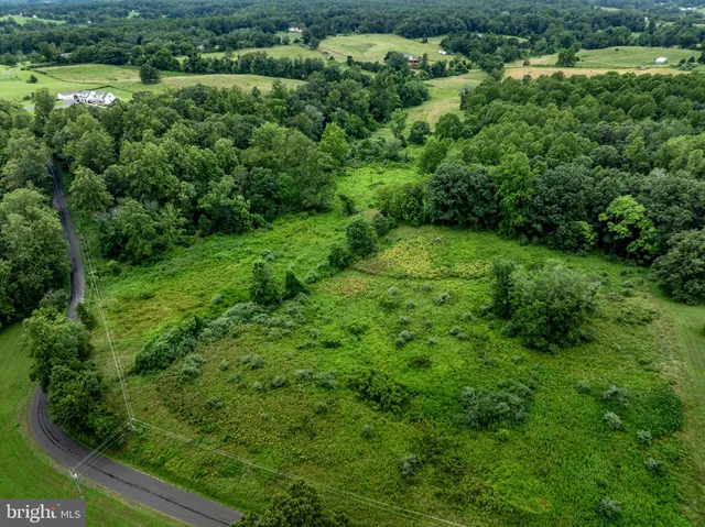 a balcony view with a seating space