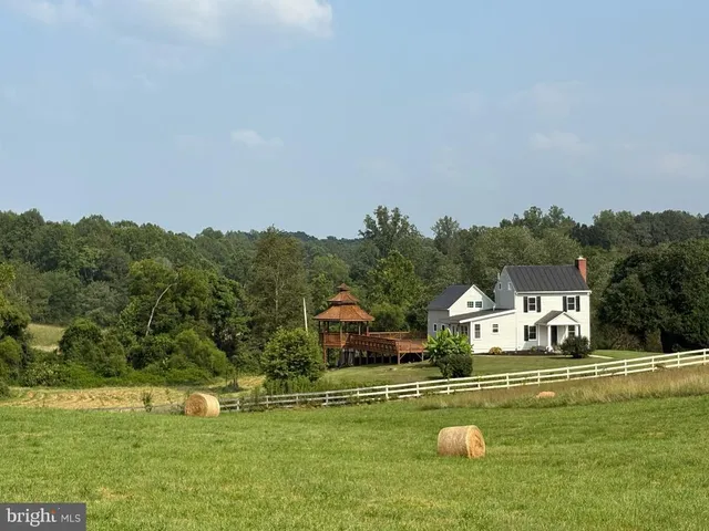 a view of a backyard of the house