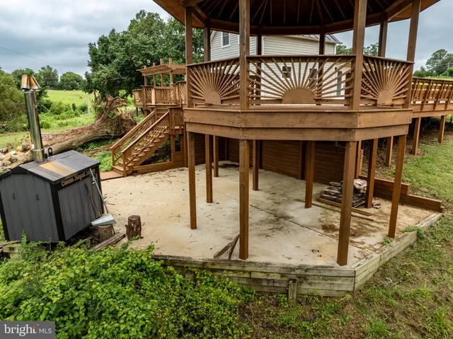 a spacious bathroom with a sink shower and a mirror