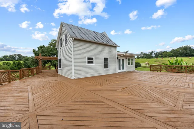 a view of an empty room with a large window