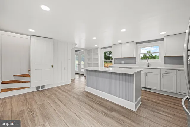 a picture of a room with a floor to ceiling window