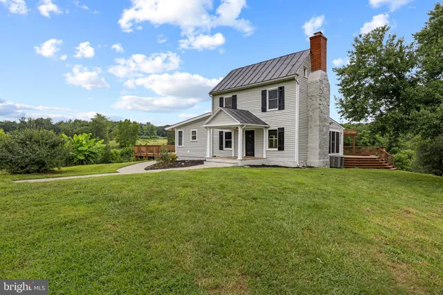 a view of a lake with a yard