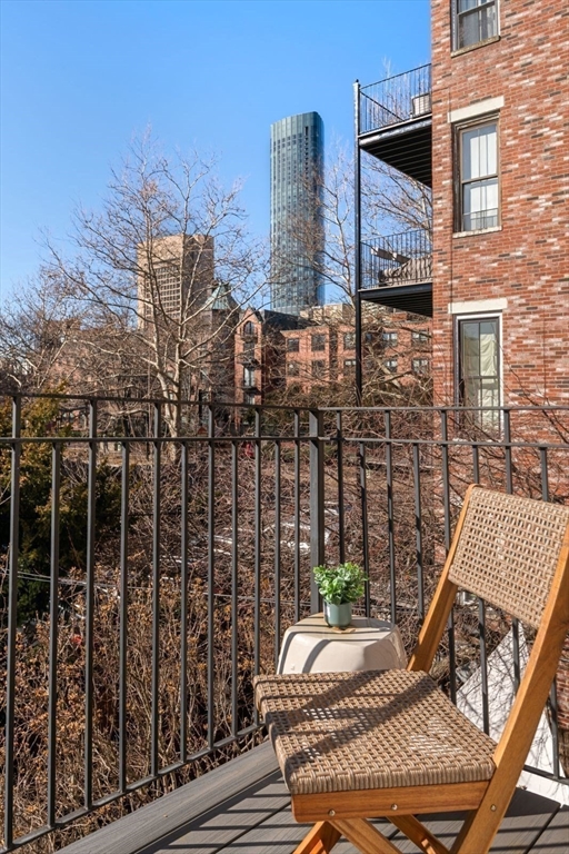 232 West Canton Street, Unit 2 Boston, MA 02116 - Photo 16 of 23 a view of balcony with wooden floor and outdoor seating