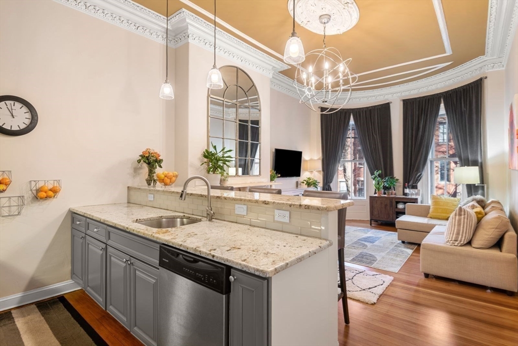 232 West Canton Street, Unit 2 Boston, MA 02116 - Photo 3 of 23 a view of living room kitchen with furniture and a large window