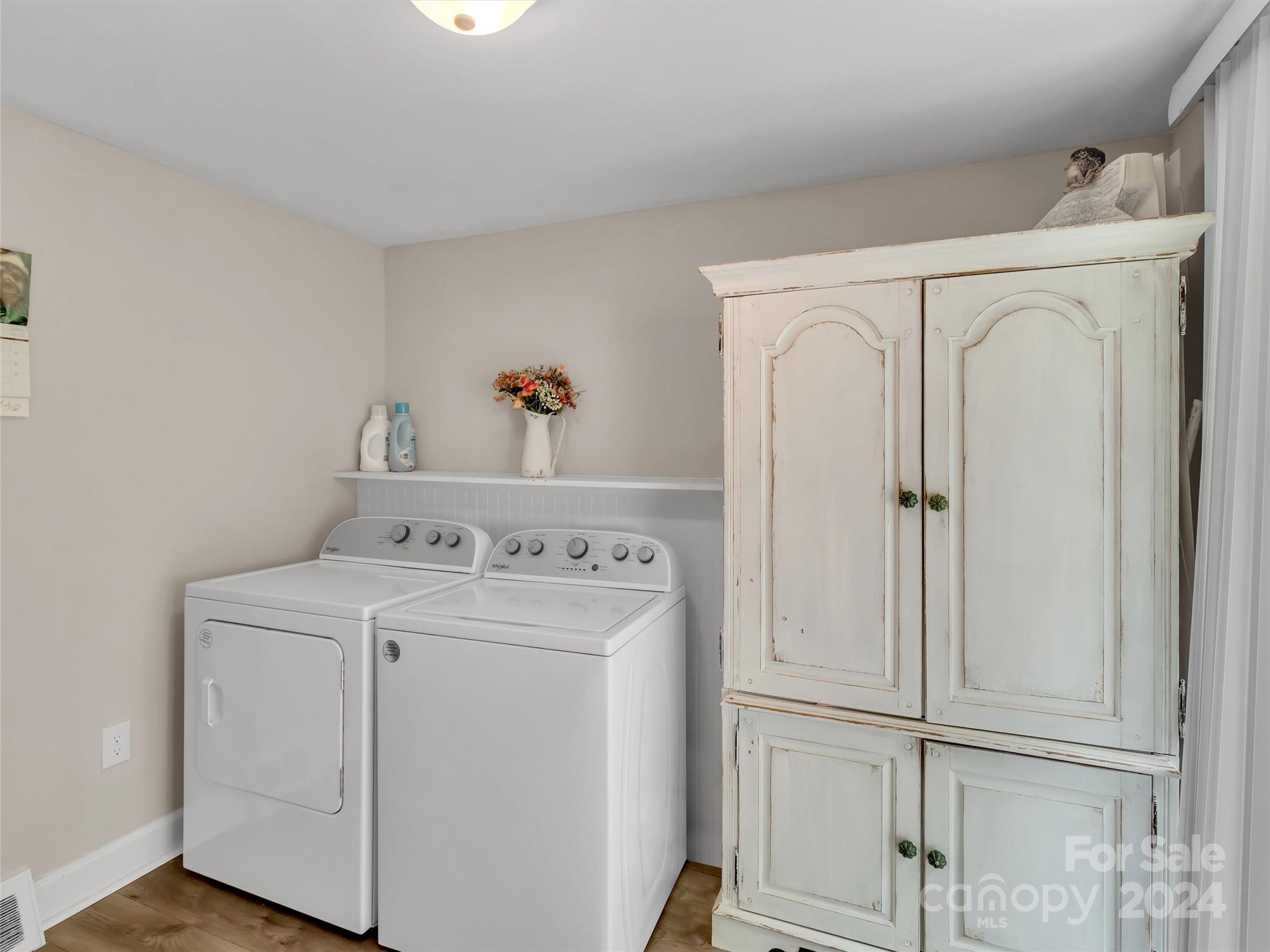 197 Mulberry Street Clyde, NC 28721 - Photo 15 of 20 a utility room with dryer and washer