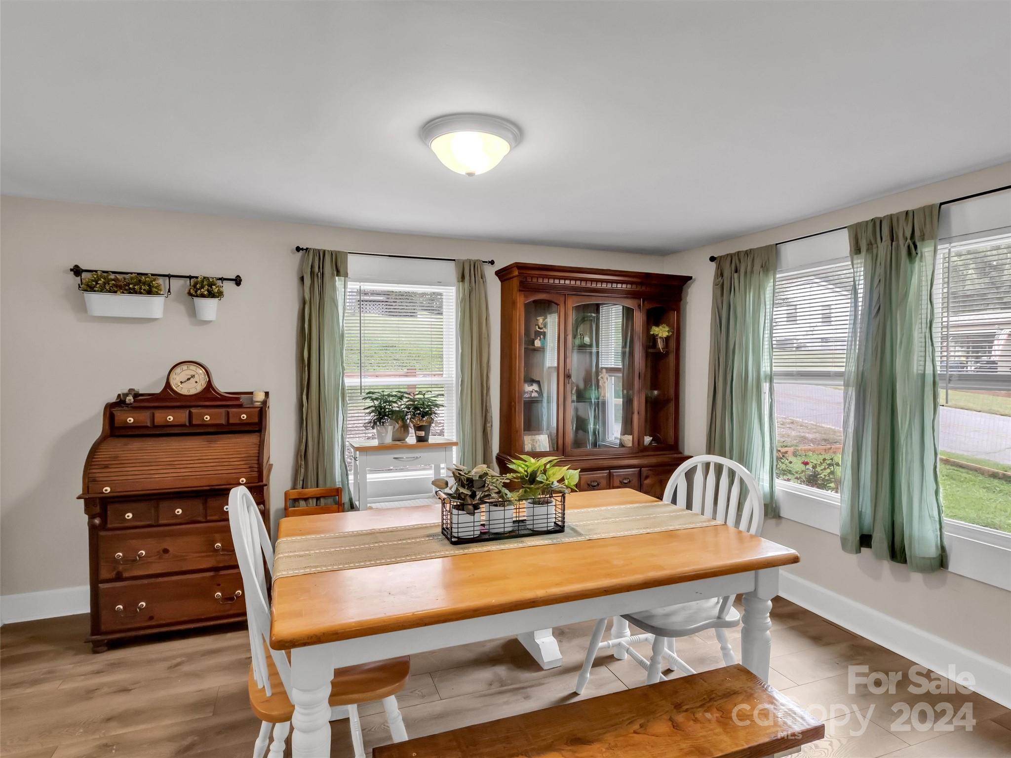 197 Mulberry Street Clyde, NC 28721 - Photo 10 of 20 a living room with furniture and wooden floor