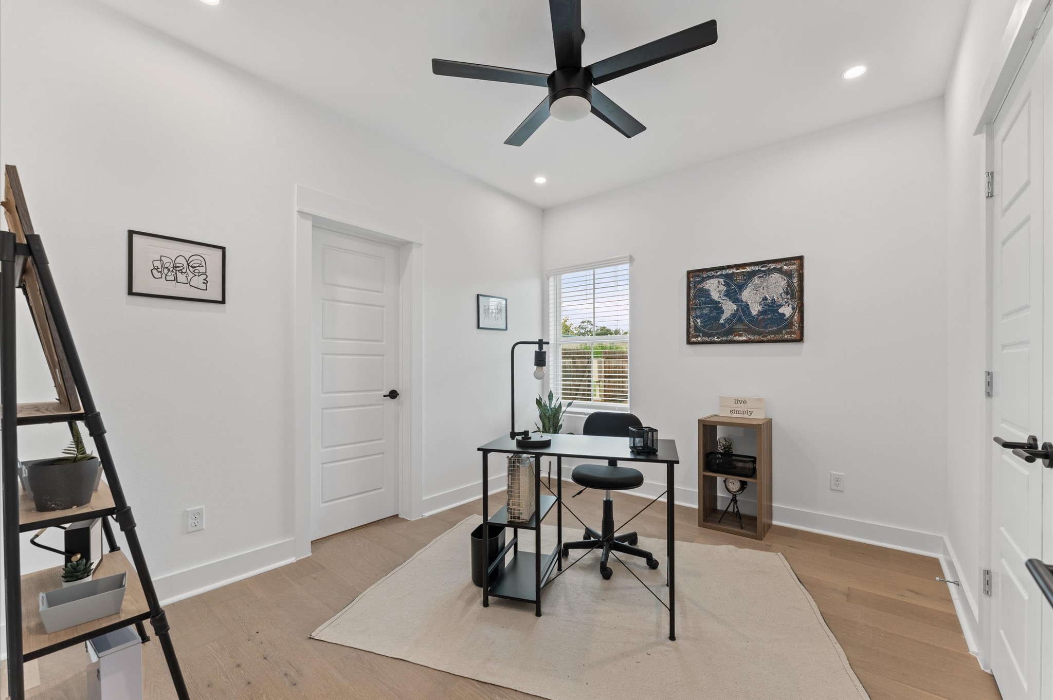 3002 Jensen Drive Houston, TX 77026 - Photo 21 of 42 Comfortable and well-appointed secondary bedroom located on the first floor, featuring convenient access to a shared Jack and Jill bathroom
