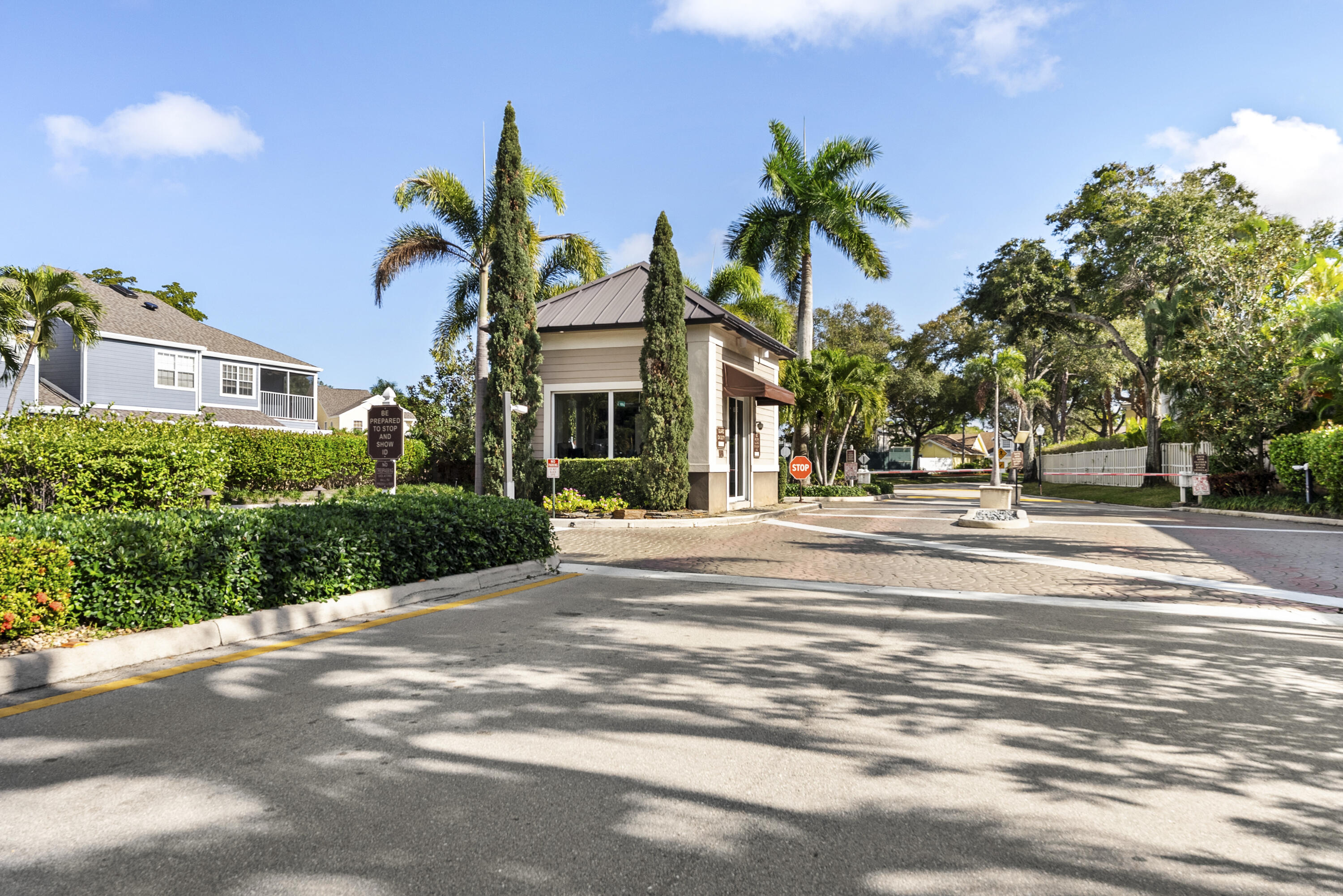 5359 Buckhead Circle, Unit 2031 Boca Raton, FL 33431 - Photo 22 of 25 a view of street with palm trees