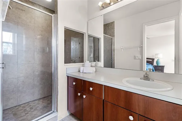 a bathroom with a sink and a mirror