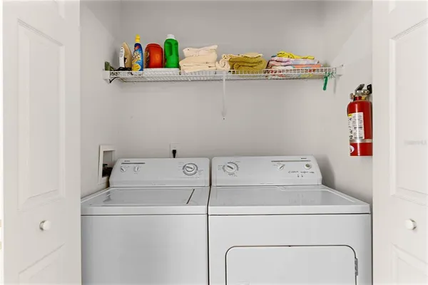 a utility room with dryer and washer