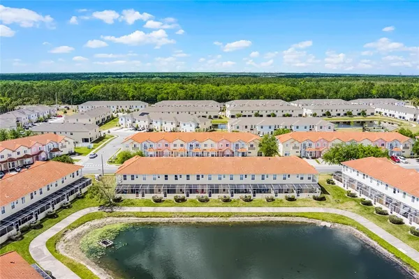 a view of swimming pool with a garden and seating area