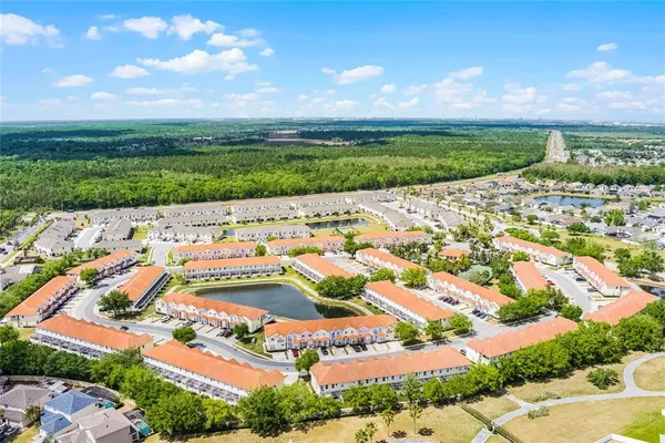 an aerial view of a house with a garden