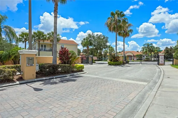 a view of a street with a building in the background