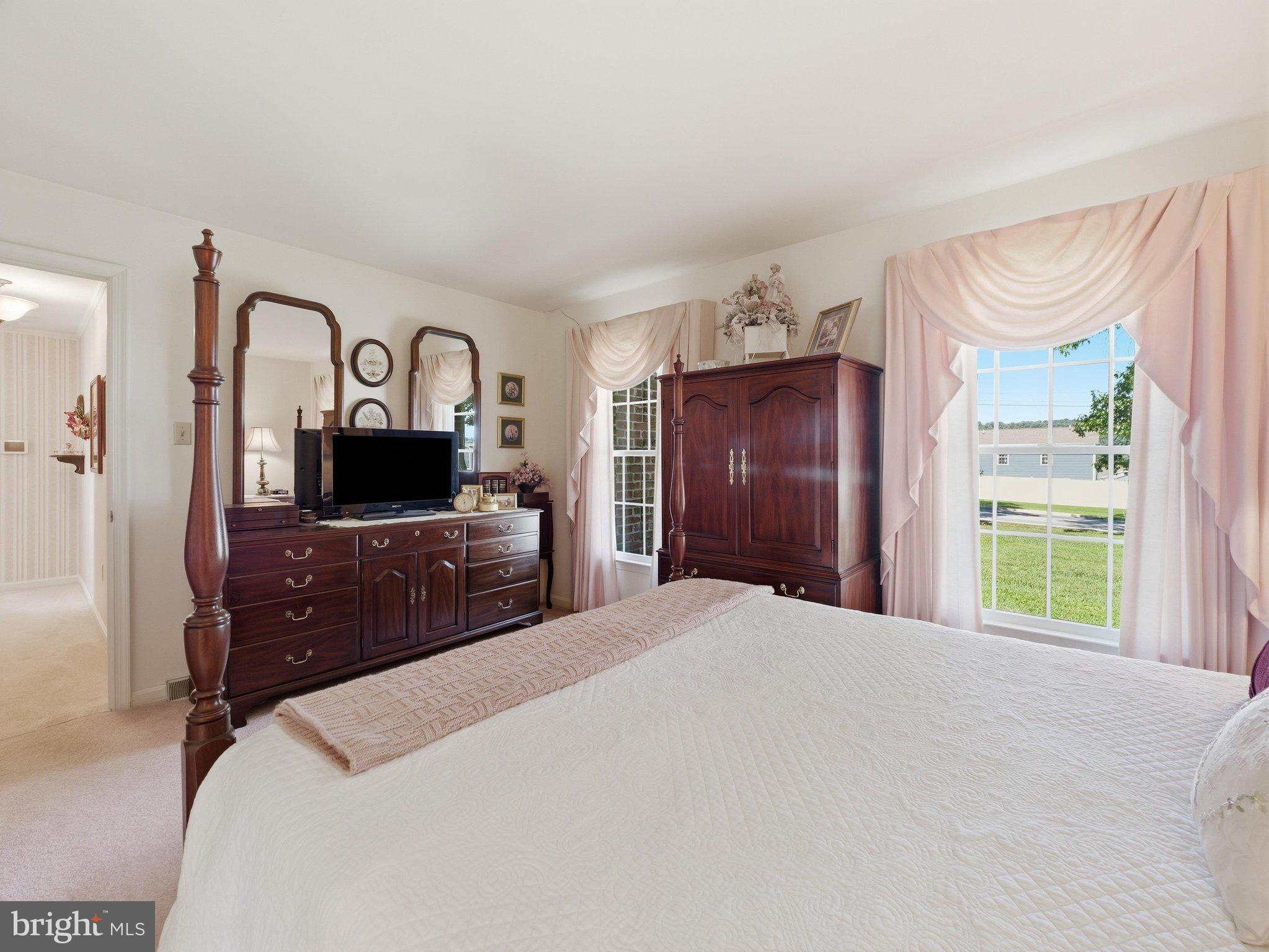 2606 Ridge Road South Martinsburg, WV 25403 - Photo 27 of 57 Serene bedroom with elegant natural light.