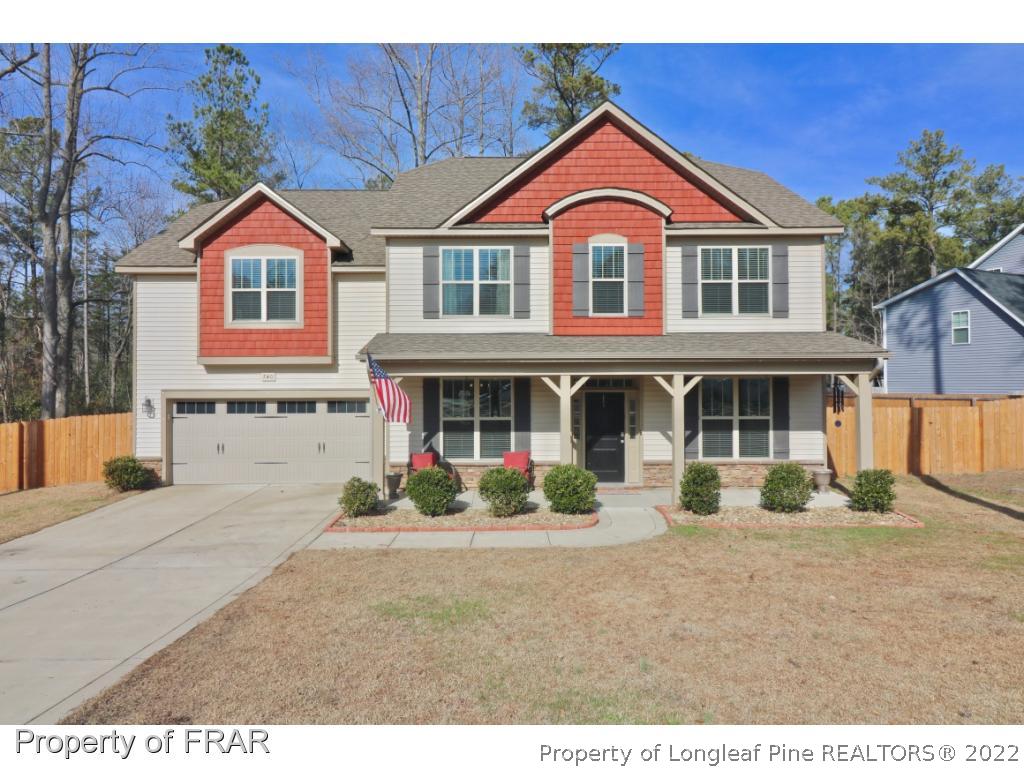 740 Sun Road Aberdeen, NC 28315 - Photo 1 of 36 a front view of a house with a yard