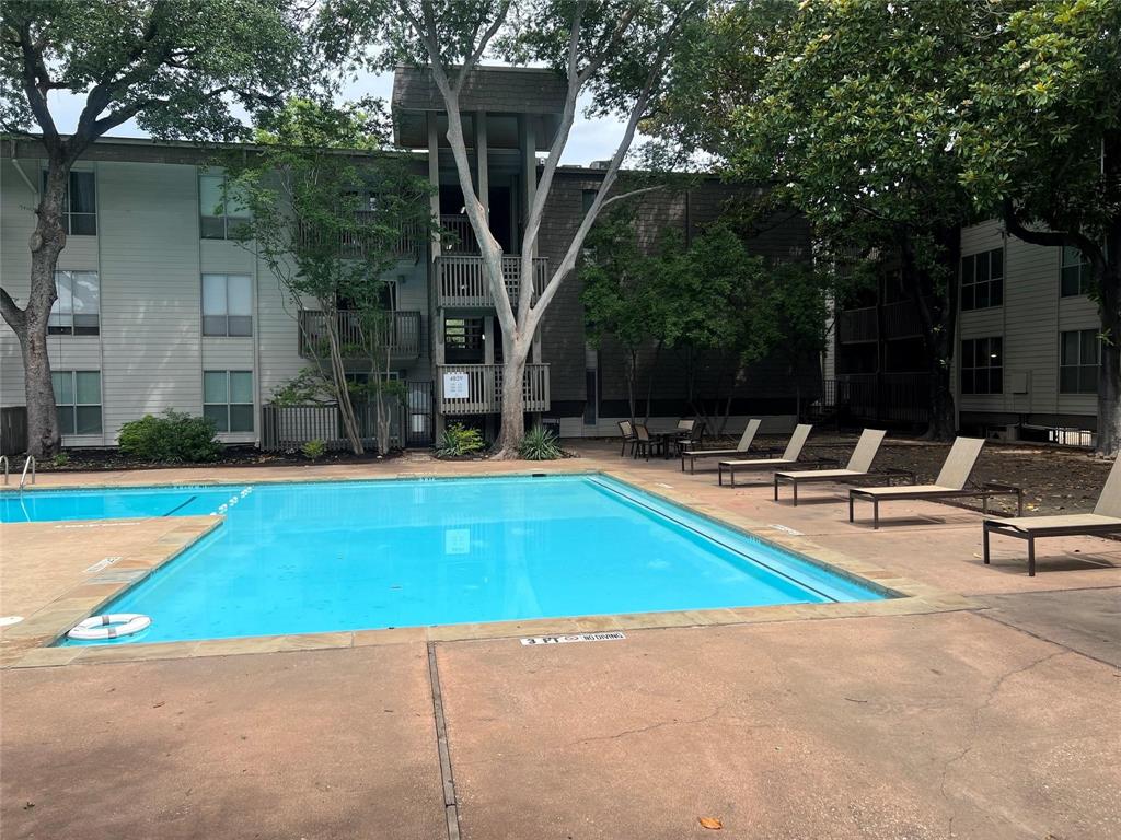 4859 Cedar Springs Road, Unit 150 Dallas, TX 75219 - Photo 8 of 24 a view of swimming pool with chairs
