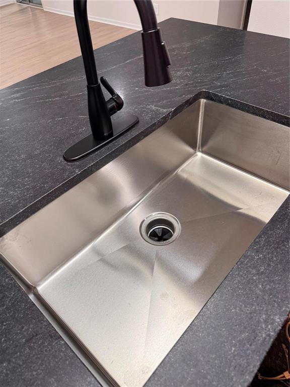 4859 Cedar Springs Road, Unit 150 Dallas, TX 75219 - Photo 9 of 24 a close view of sink