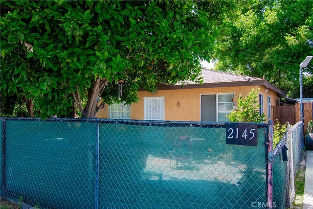 a view of a back yard with green space