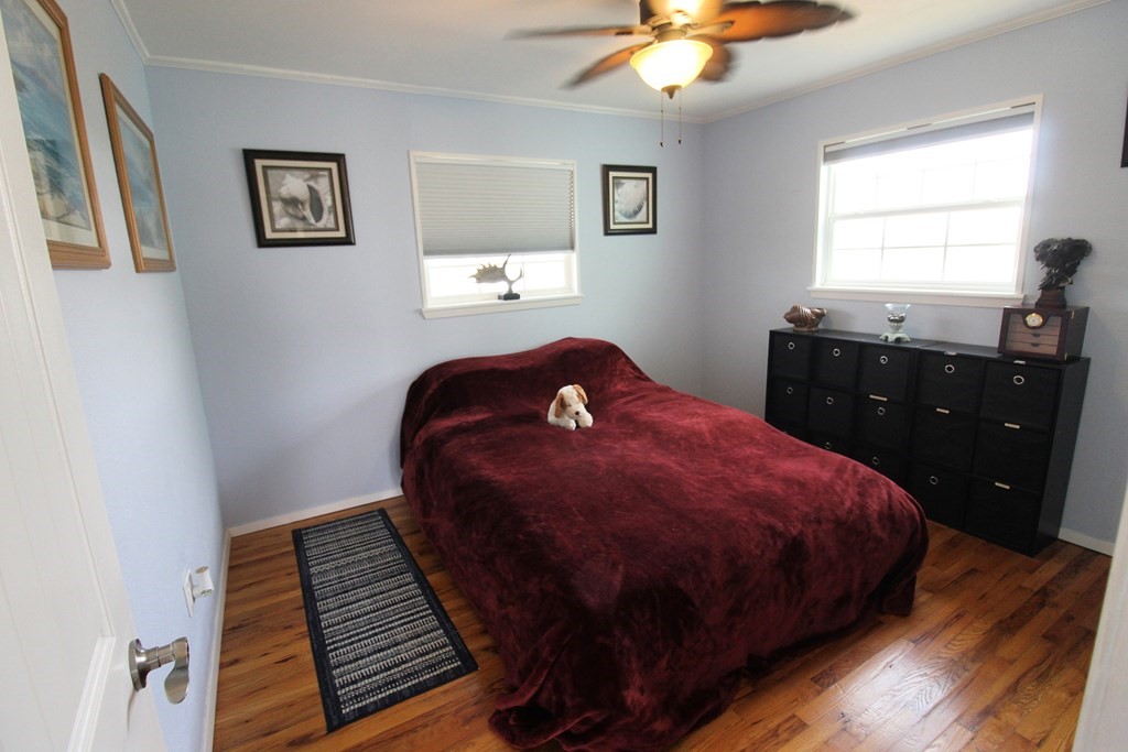 189 Sailfish Drive Rockport, TX 78382 - Photo 27 of 40 a bedroom with a bed and a dresser
