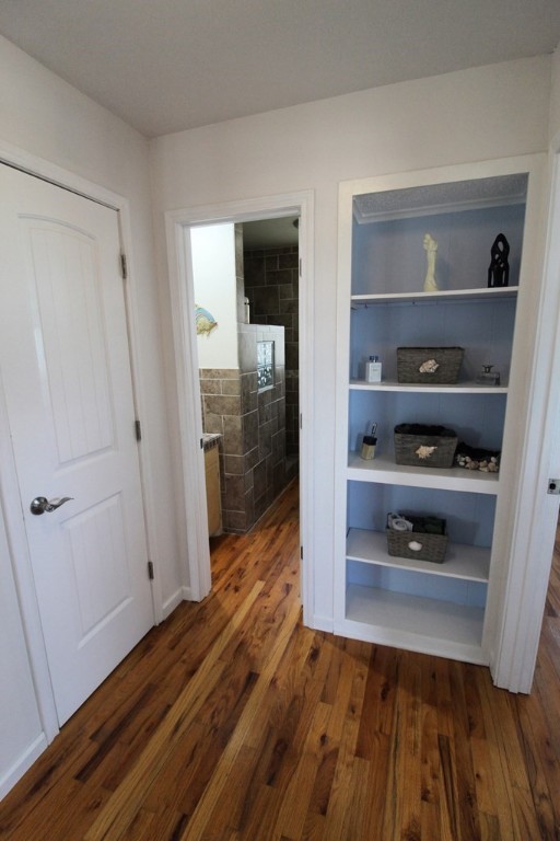 189 Sailfish Drive Rockport, TX 78382 - Photo 28 of 40 a view of walk in closet with clothes and shoes