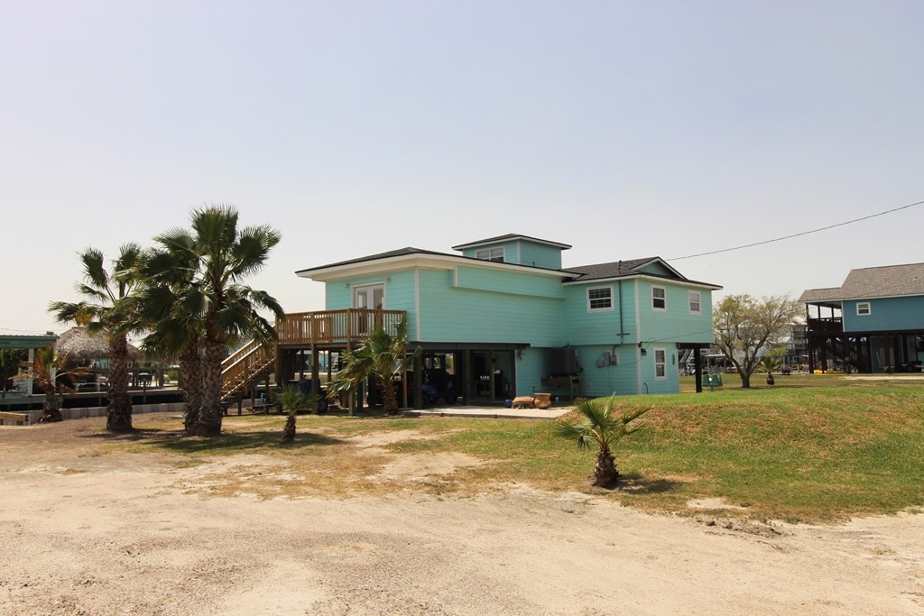 189 Sailfish Drive Rockport, TX 78382 - Photo 31 of 40 a view of a house with a yard