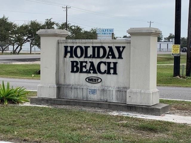 189 Sailfish Drive Rockport, TX 78382 - Photo 36 of 40 a front view of a house with garden