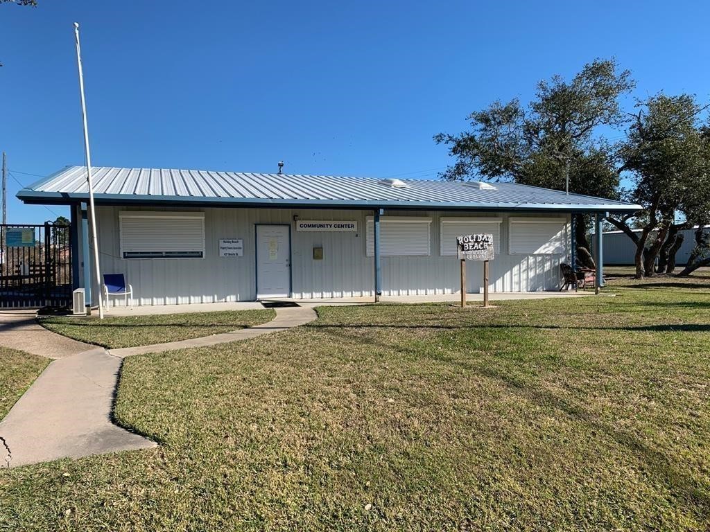 189 Sailfish Drive Rockport, TX 78382 - Photo 37 of 40 a view of a house with a yard