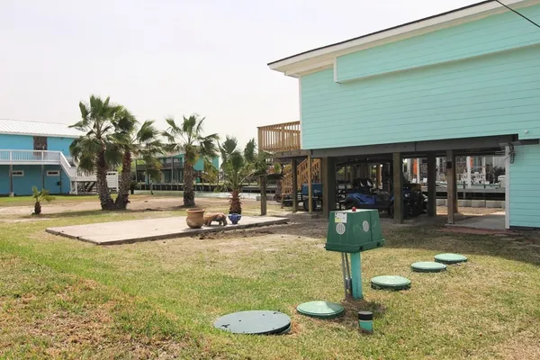 a view of a swimming pool with sitting area