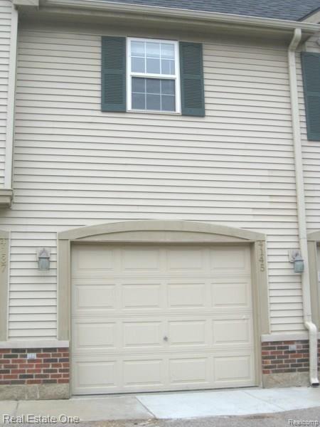4145 Hampton Ridge Boulevard, Unit 32 Howell, MI 48843 - Photo 25 of 28 Back of Condo.jpg