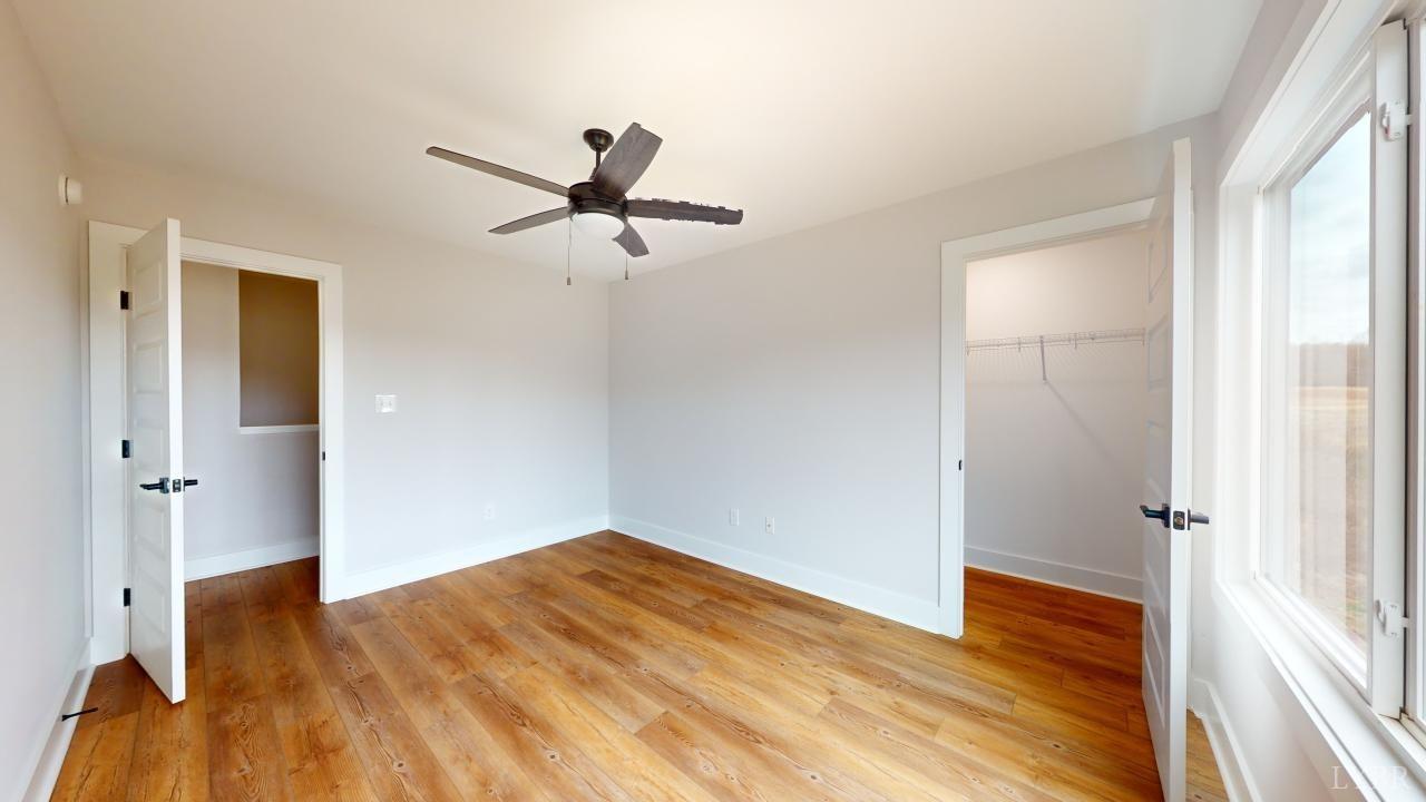 53 Shallen Road Rustburg, VA 24588 - Photo 27 of 46 a view of empty room with wooden floor and fan