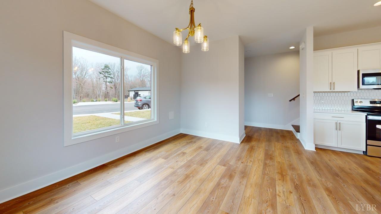 53 Shallen Road Rustburg, VA 24588 - Photo 43 of 46 a view of a kitchen with wooden floor and a kitchen