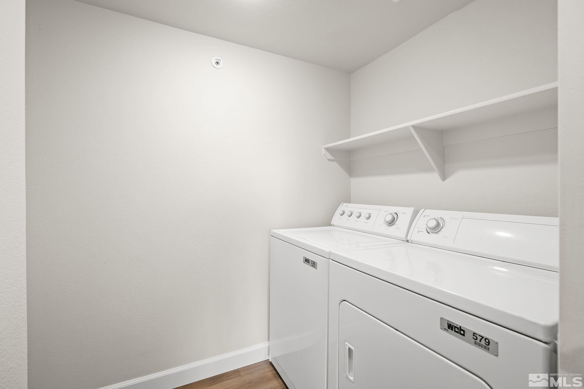 6850 Sharlands Avenue, Unit 2109 Reno, NV 89523 - Photo 15 of 16 a utility room with dryer and washer