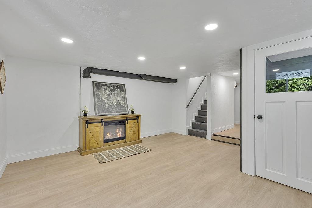 1009 37th St Extension Beaver Falls, PA 15010 - Photo 20 of 33 Game room with an electric fireplace.