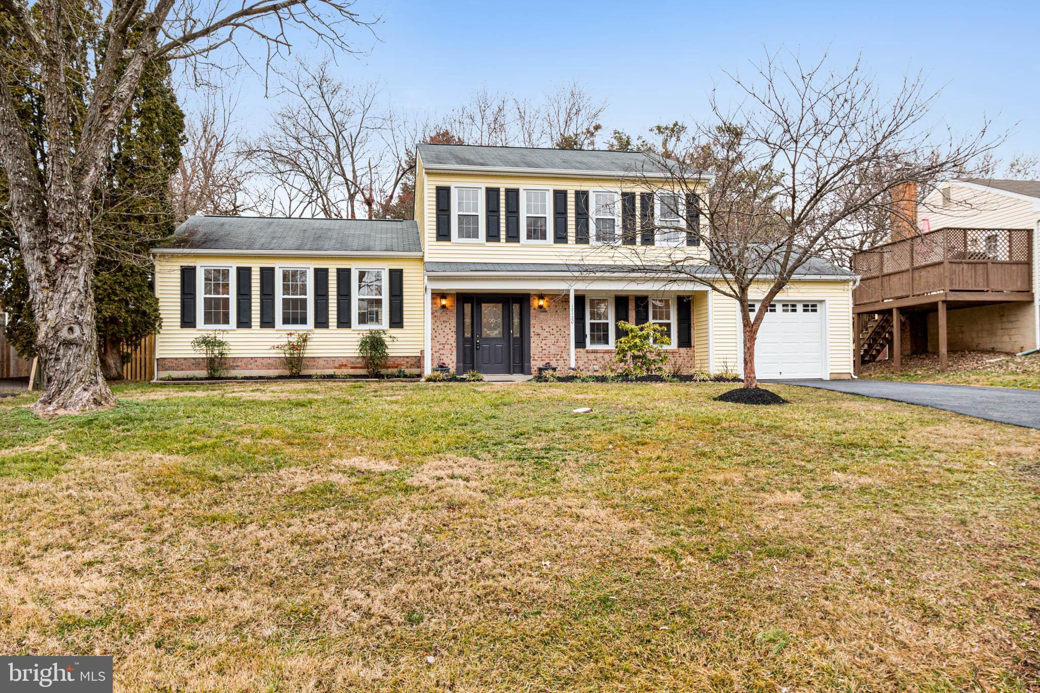 17120 Whites Road Poolesville, MD 20837 - Photo 2 of 30 a front view of a house with a garden