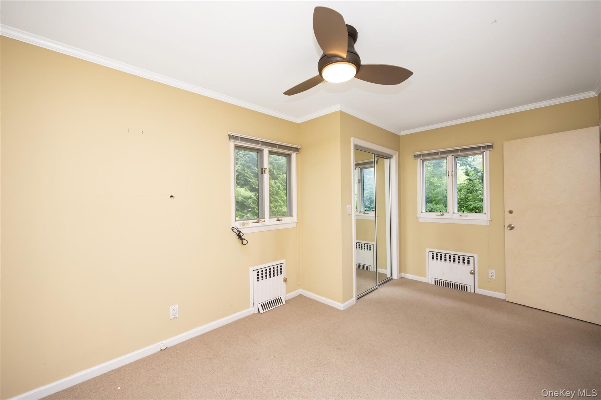 3 Buckingham Place Great Neck, NY 11021 - Photo 20 of 28 a view of an empty room with a window