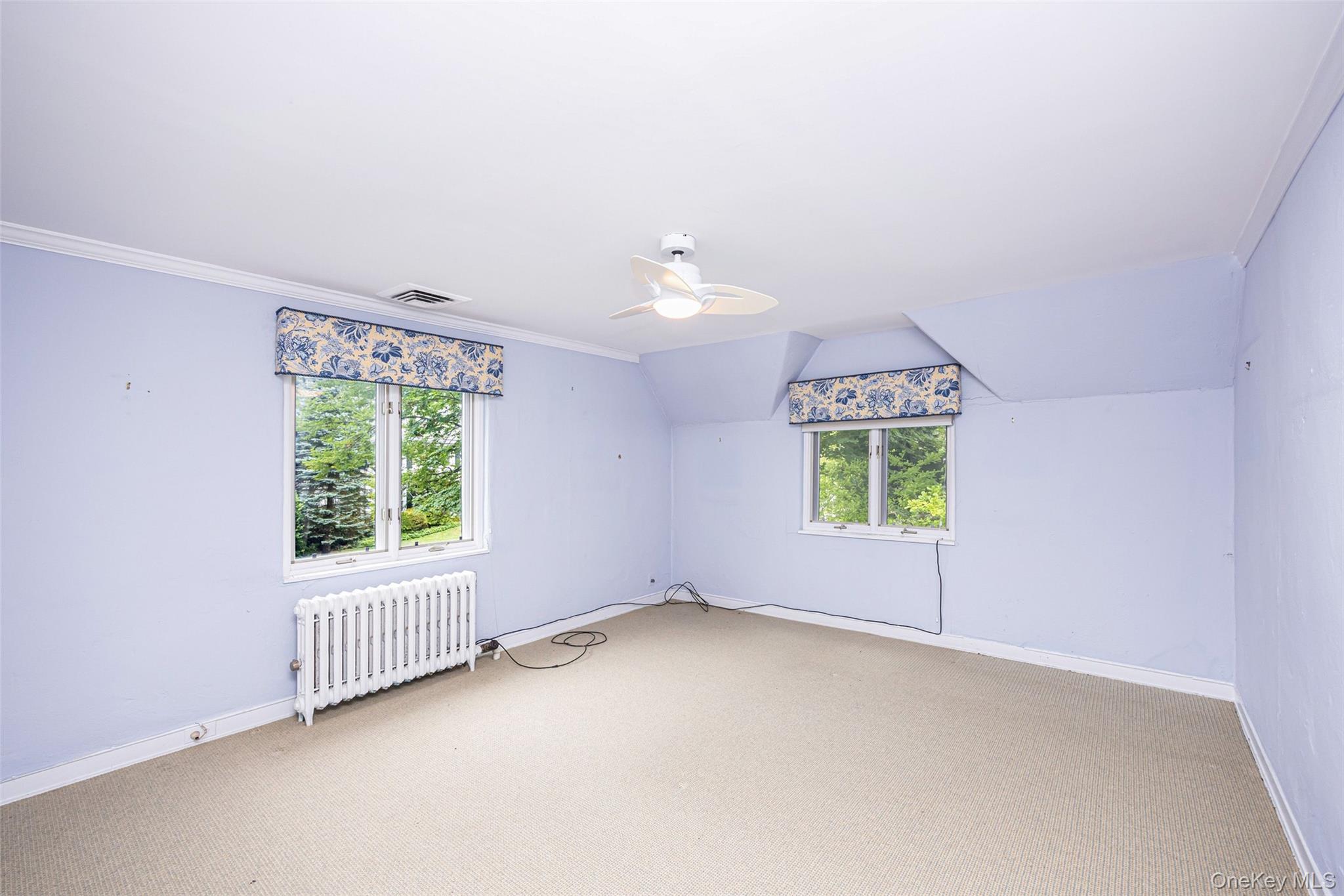 3 Buckingham Place Great Neck, NY 11021 - Photo 21 of 28 an empty room with windows