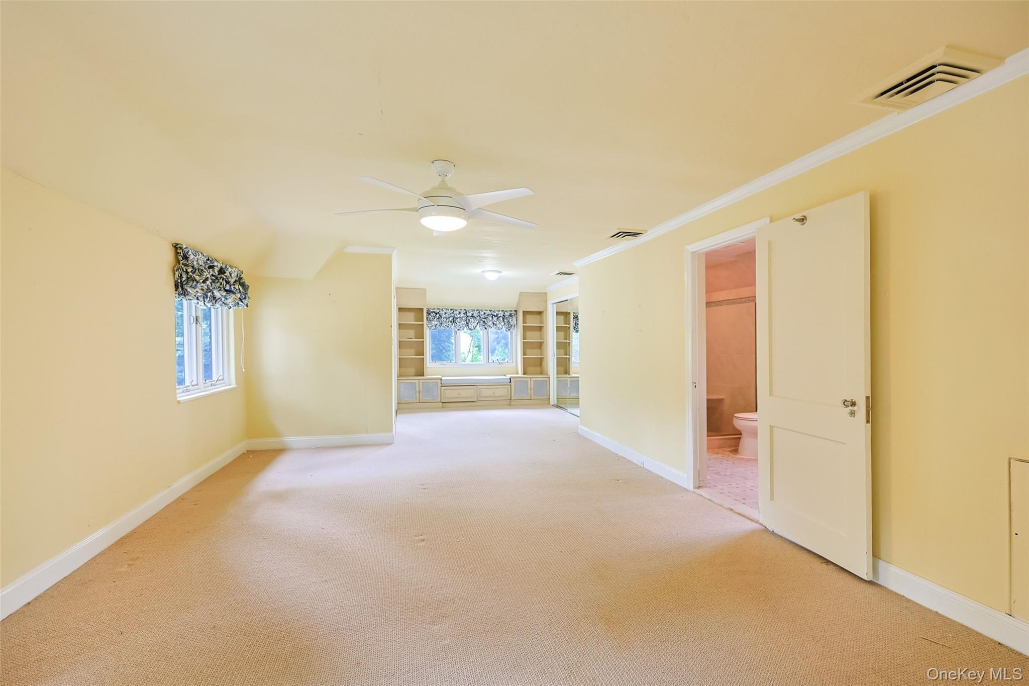3 Buckingham Place Great Neck, NY 11021 - Photo 23 of 28 a view of a livingroom with a staircase