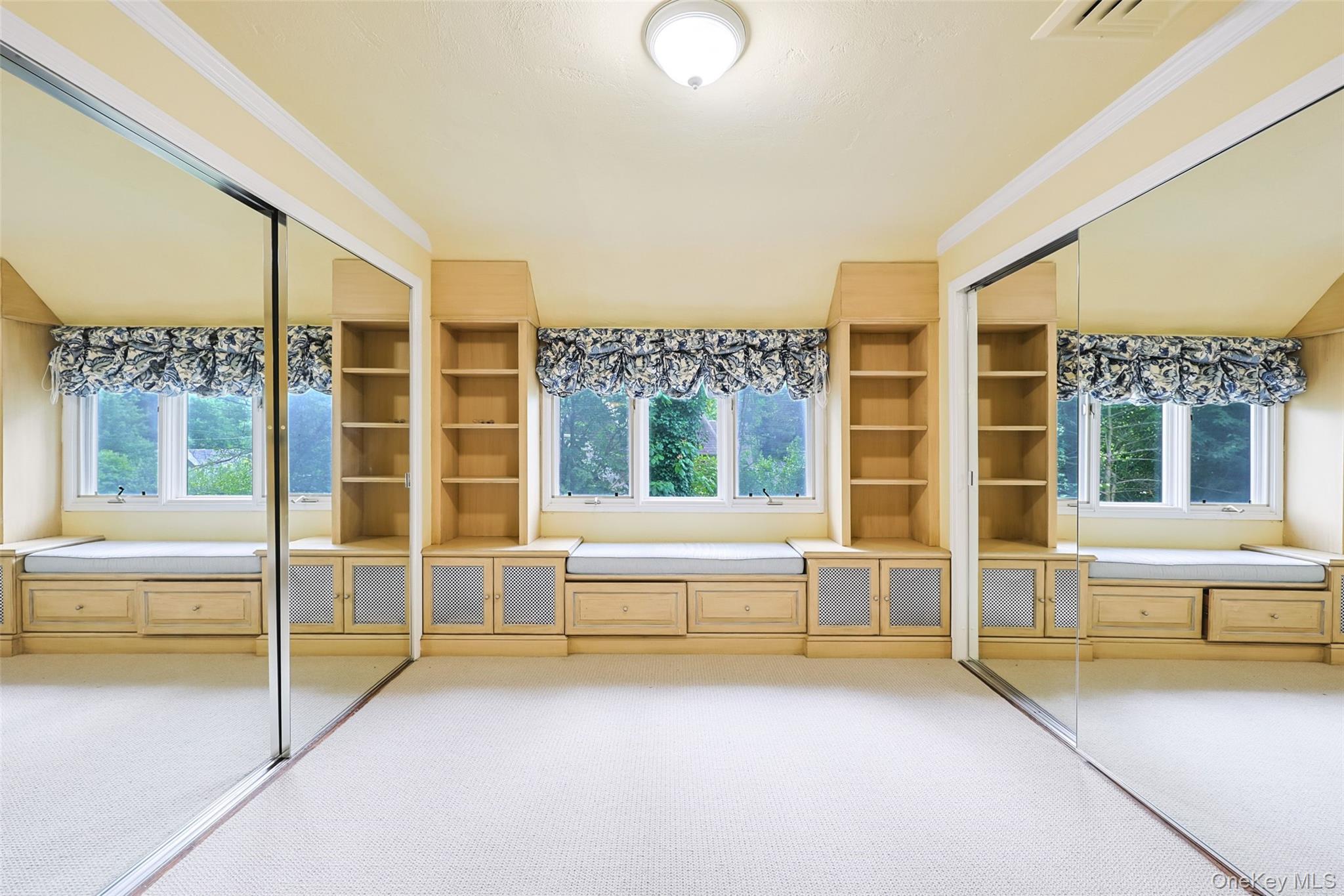 3 Buckingham Place Great Neck, NY 11021 - Photo 25 of 28 a view of an empty room with a balcony and large window