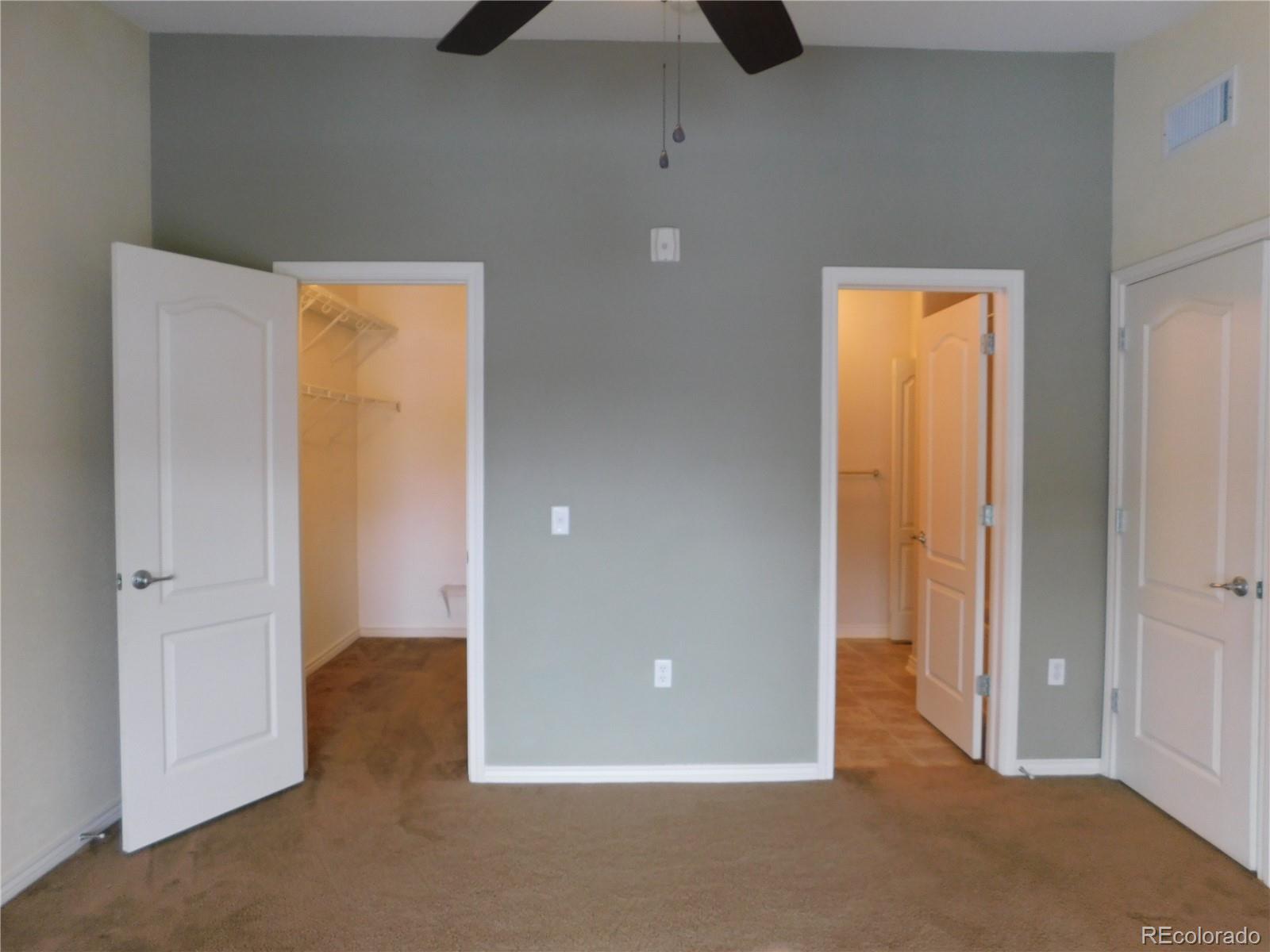 18669 Stroh Road, Unit 10204 Parker, CO 80134 - Photo 18 of 28 an empty room with window